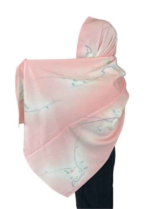 A pale pink kimono hijab that is pleased by Muslims